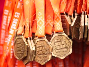 Siguldas pusmaratonā triumfē Jānis Girgensons un Ilona Marhele